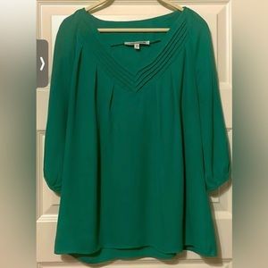 Kelly Green blouse from Francesca’s with pleated detail on collar.